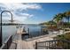 Wooden community boat dock with seating at 322 Ibisview Ln, Apollo Beach, FL 33572