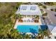 Small community pool with adjacent clubhouse and lounge chairs at 322 Ibisview Ln, Apollo Beach, FL 33572