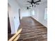 Spacious dining room with wood-look floors and ceiling fan at 4510 Helena Ne St, St Petersburg, FL 33703