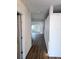 Bright hallway with wood-look floors leading to spacious living areas at 4510 Helena Ne St, St Petersburg, FL 33703
