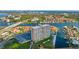 Aerial view showcasing the building's waterfront location and surrounding landscape at 4900 Brittany S Dr # 206, St Petersburg, FL 33715