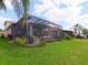 Spacious screened patio with outdoor heaters at 5011 Sandy Brook Cir, Wimauma, FL 33598