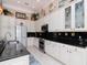 Well-equipped kitchen with stainless steel appliances and ample cabinetry at 5011 Sandy Brook Cir, Wimauma, FL 33598