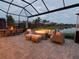 Outdoor patio with fire pit and seating area at 5011 Sandy Brook Cir, Wimauma, FL 33598