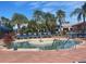 Relaxing circular spa surrounded by lounge chairs at 5011 Sandy Brook Cir, Wimauma, FL 33598