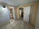 Clean bathroom with shower/tub combo and built-in shelving at 6928 E 29Th Ave, Tampa, FL 33619