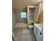 Bright bathroom featuring a bathtub, toilet, and vanity at 6928 E 29Th Ave, Tampa, FL 33619