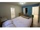 Bedroom with a double bed and access to closets at 6928 E 29Th Ave, Tampa, FL 33619