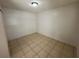 Spacious bedroom with tiled floors and neutral walls at 6928 E 29Th Ave, Tampa, FL 33619