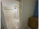 Empty closet with hanging rod and light at 6928 E 29Th Ave, Tampa, FL 33619