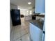 Updated kitchen with stainless steel appliances and granite at 6928 E 29Th Ave, Tampa, FL 33619
