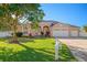 Beautiful one-story house with a three-car garage and a mailbox at 9122 65Th N Way, Pinellas Park, FL 33782