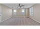 Spacious bedroom with ceiling fan and carpet flooring at 4522 Bay Spring Ct, Tampa, FL 33611