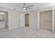 Bright bedroom with carpet, ceiling fan and walk-in closet at 4522 Bay Spring Ct, Tampa, FL 33611