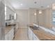 Modern kitchen with granite counters and stainless steel appliances at 4522 Bay Spring Ct, Tampa, FL 33611