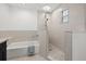 Bathroom with a walk-in shower and soaking tub at 100 Riviera Ne Way, St Petersburg, FL 33704