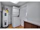 Laundry area with washer, dryer, and water heater at 10331 109Th Ave, Largo, FL 33773