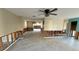 Large living room with tiled floors and exposed framing at 11441 47Th N Ave, St Petersburg, FL 33708