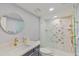 Updated bathroom with walk-in shower and designer tile at 1600 Gulf Blvd # 1112, Clearwater, FL 33767