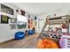 Themed bedroom with bunk beds and sports decor at 323 Hawk Talon Dr, Lithia, FL 33547