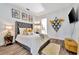 Bright bedroom with plush bed and neutral decor at 323 Hawk Talon Dr, Lithia, FL 33547