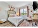 Bedroom with a comfy bed and relaxing decor at 323 Hawk Talon Dr, Lithia, FL 33547
