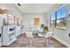 Bright home office with large window and hardwood floors at 323 Hawk Talon Dr, Lithia, FL 33547