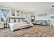 Luxurious main bedroom with king-size bed and sitting area at 323 Hawk Talon Dr, Lithia, FL 33547