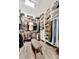 Spacious walk-in closet offering extensive storage solutions at 323 Hawk Talon Dr, Lithia, FL 33547