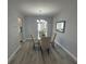 Elegant dining room featuring a glass table and neutral tones at 3448 100Th N Ter, Pinellas Park, FL 33782