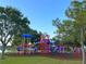 Community playground featuring multiple play areas for  at 3448 100Th N Ter, Pinellas Park, FL 33782