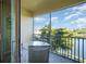 Screened balcony overlooking a lake with beautiful water views at 4284 Expedition Way, Osprey, FL 34229