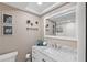Modern bathroom featuring marble countertop and updated fixtures at 4915 Bay Ne St # 130, St Petersburg, FL 33703