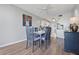Charming dining room with hardwood floors and a view of the kitchen at 4915 Bay Ne St # 130, St Petersburg, FL 33703
