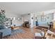 Spacious living area with hardwood floors, a home office space, and ample natural light at 4915 Bay Ne St # 130, St Petersburg, FL 33703