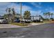 Home with RV and trucks parked in driveway at 498 Crystal Dr, Madeira Beach, FL 33708