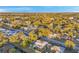 Aerial view of a single Gathering home with solar panels in a residential area at 7100 14Th N St, St Petersburg, FL 33702