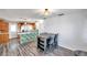 Dining area with table and chairs, open to kitchen and living room at 7100 14Th N St, St Petersburg, FL 33702