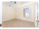 Well-lit bedroom with tile flooring and a window with blinds at 9515 Citrus Glen Pl, Tampa, FL 33618