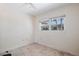 Empty bedroom featuring a window and ceiling fan at 10244 Tarpon Dr, Treasure Island, FL 33706