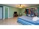 Spacious bedroom with a closet and tiled floors at 11008 Browning Rd, Lithia, FL 33547