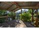 Wooden deck overlooking the pool and backyard at 11008 Browning Rd, Lithia, FL 33547