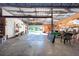 Spacious garage with storage shelves and open bay doors at 11008 Browning Rd, Lithia, FL 33547