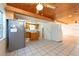Kitchen boasts wood cabinets, stainless steel appliances and island at 11008 Browning Rd, Lithia, FL 33547