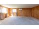 Bright living room with wood walls and ceiling at 11008 Browning Rd, Lithia, FL 33547