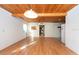 Spacious living room featuring hardwood floors and wood ceilings at 11008 Browning Rd, Lithia, FL 33547