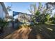 Screened pool with lush landscaping and spacious backyard at 11008 Browning Rd, Lithia, FL 33547