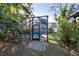Enjoy this beautiful screened pool and lush backyard oasis at 11008 Browning Rd, Lithia, FL 33547