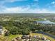 Aerial view of community with lakes and landscape at 11149 Golden Silence Dr, Riverview, FL 33579