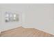 Bright bedroom featuring a large window with plenty of natural light at 1200 Country Club Dr # 3204, Largo, FL 33771